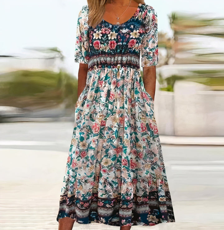 "Elegante bohemian jurk voor vrouwen, luchtig en stijlvol, Oranje-Blauw, met boho-chic details voor zomerse dagen."