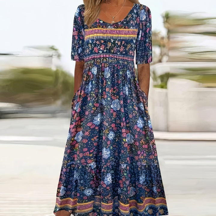 "Elegante bohemian jurk voor vrouwen, luchtig en stijlvol, Oranje-Blauw, met boho-chic details voor zomerse dagen."