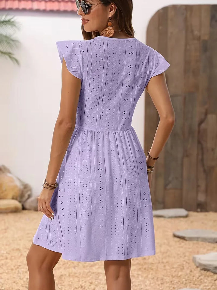 Casual dames A-lijn jurk, perfect voor de zomer met vlindermouwen en kant.