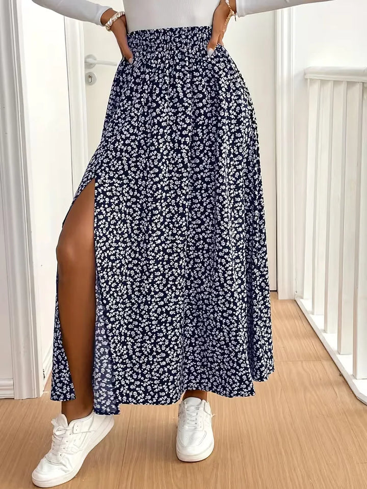 Dames A-lijn zomerrok, maxi lengte, met trendy bloemenprint. Perfect voor warme dagen.