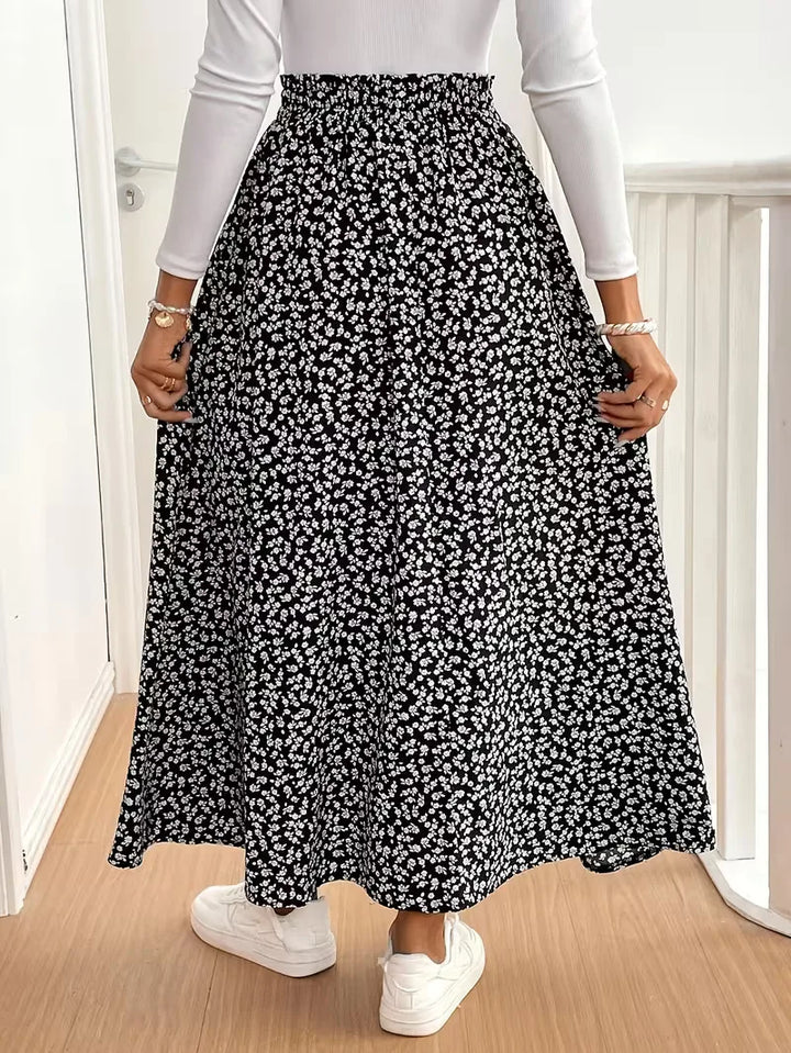 Comfortabele A-lijn maxirok voor dames, bohemian stijl, met bloemenprint en elastische taille.