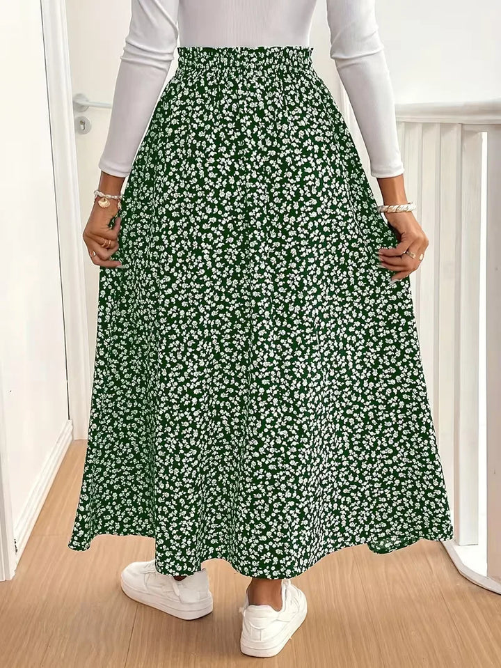 Zomerse dames A-lijn rok, maxi lengte, met prachtige bloemenprint en zijsplit.
