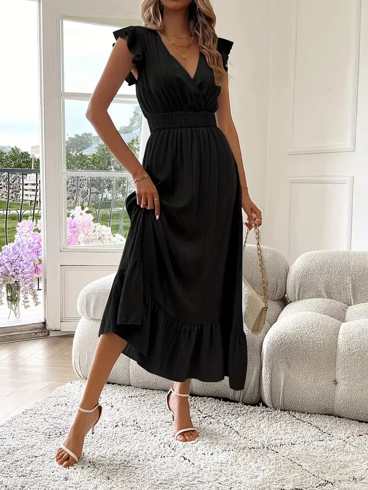 Vloeiende avondjurk, V-hals en gelaagde maxi rok, creëert een gracieuze look voor dames.