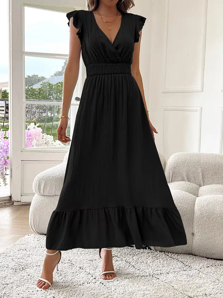 Chic en comfortabel: Avondjurk met V-hals en gelaagde maxi rok, perfect voor een stijlvolle vrouw.
