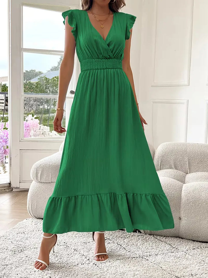 Trendy avondjurk dames, V-hals en gelaagde maxi rok, voor een modieuze verschijning op feesten.