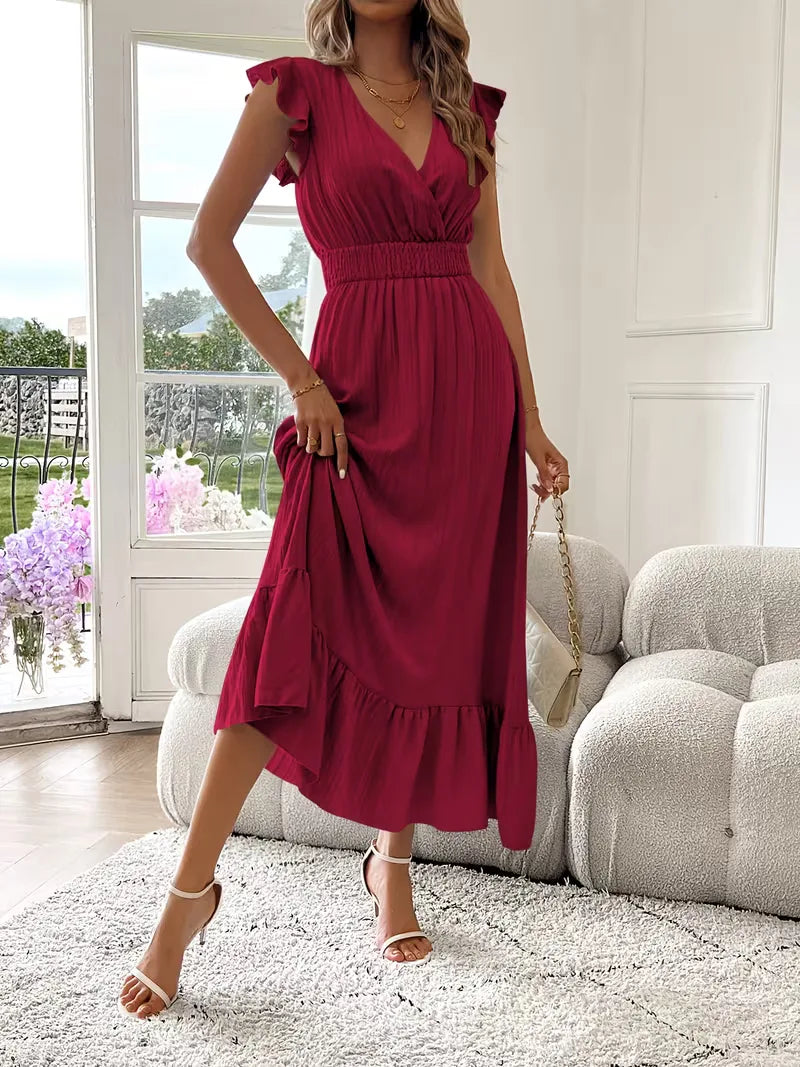 Deze damesjurk, V-hals en gelaagde maxi rok, combineert elegantie met comfort voor avonden.