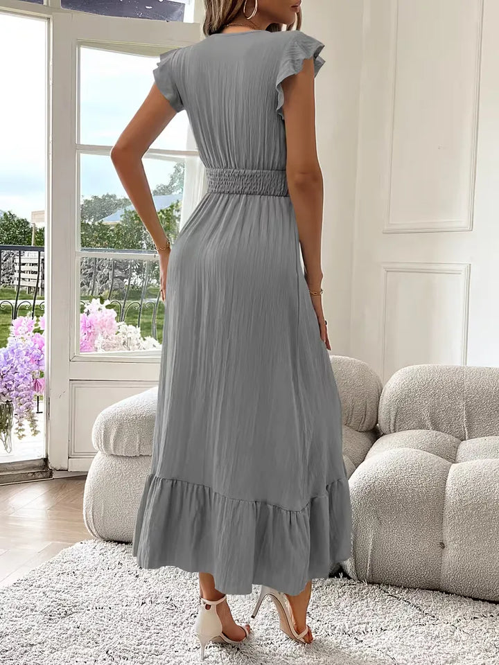 Maxi jurk: Dames avondjurk met V-hals en dynamische gelaagde rok, perfect voor de rode loper.