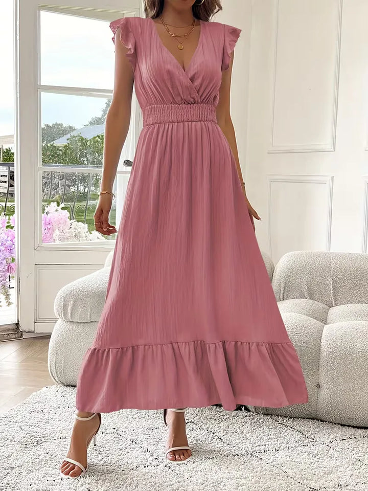 Dames avondjurk met V-hals en gelaagde maxi rok, perfect voor formele gelegenheden.