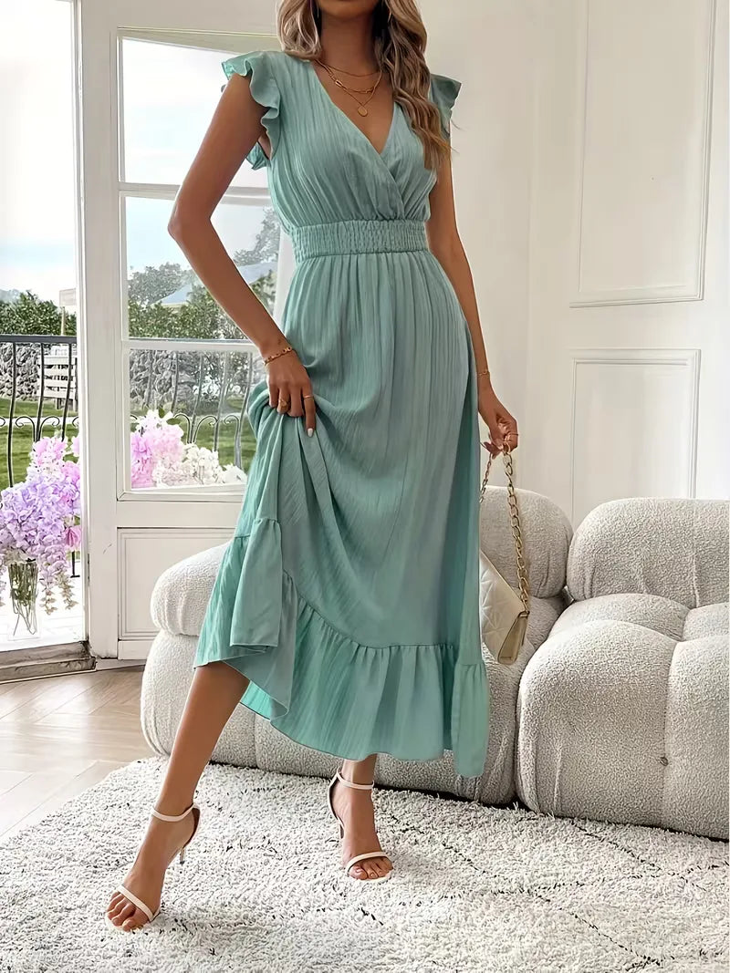 Stijlvolle zomerjurk met V-hals en gelaagde maxi rok, ideaal als feestjurk voor dames.