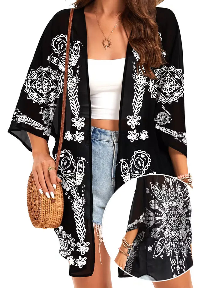 Elegante dames chiffon kimono cover-up met prachtige bloemenprint, ideaal voor strand of zomer.