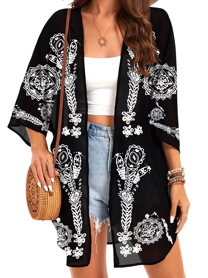 Lichtgewicht dames chiffon kimono met 3kwartmouwen en bloemenprint, ideaal als elegante cover-up.