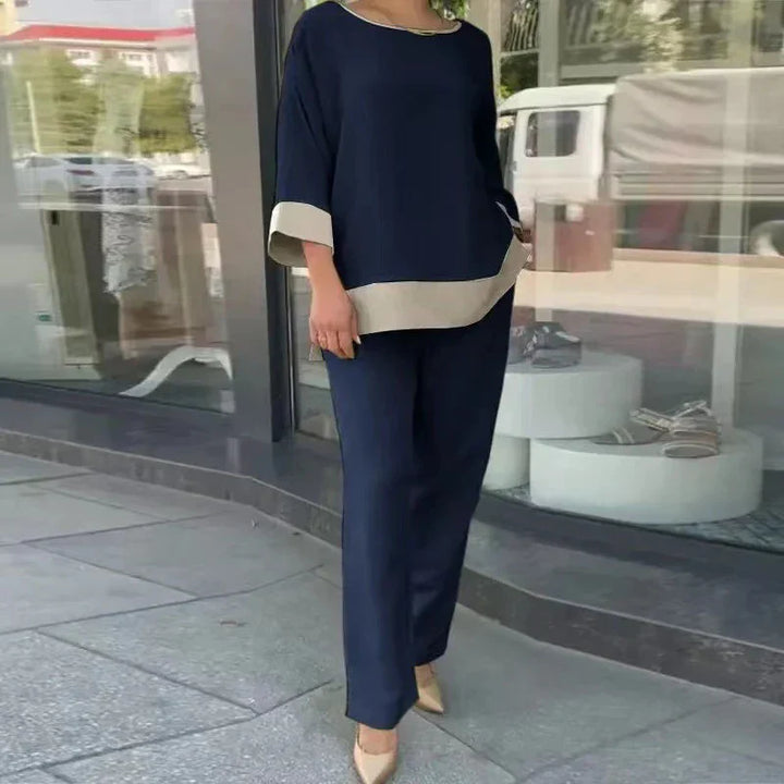 Lichtgewicht dames co-ord set met flatterende top en comfortabele rechte broek; veelzijdig voor lente en zomer outfits.