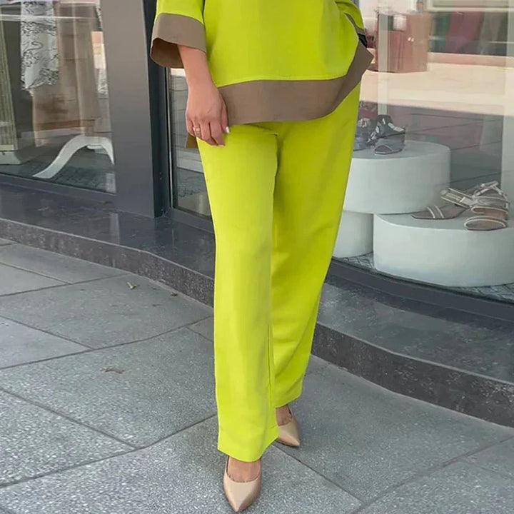 Comfortabele en luchtige dames co-ord set. De elegante top en rechte broek zijn ideaal voor lente mode en zomer.