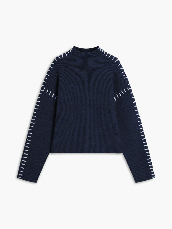 Klassieke dames coltrui met een elegante pasvorm, essentieel voor wintergarderobe.