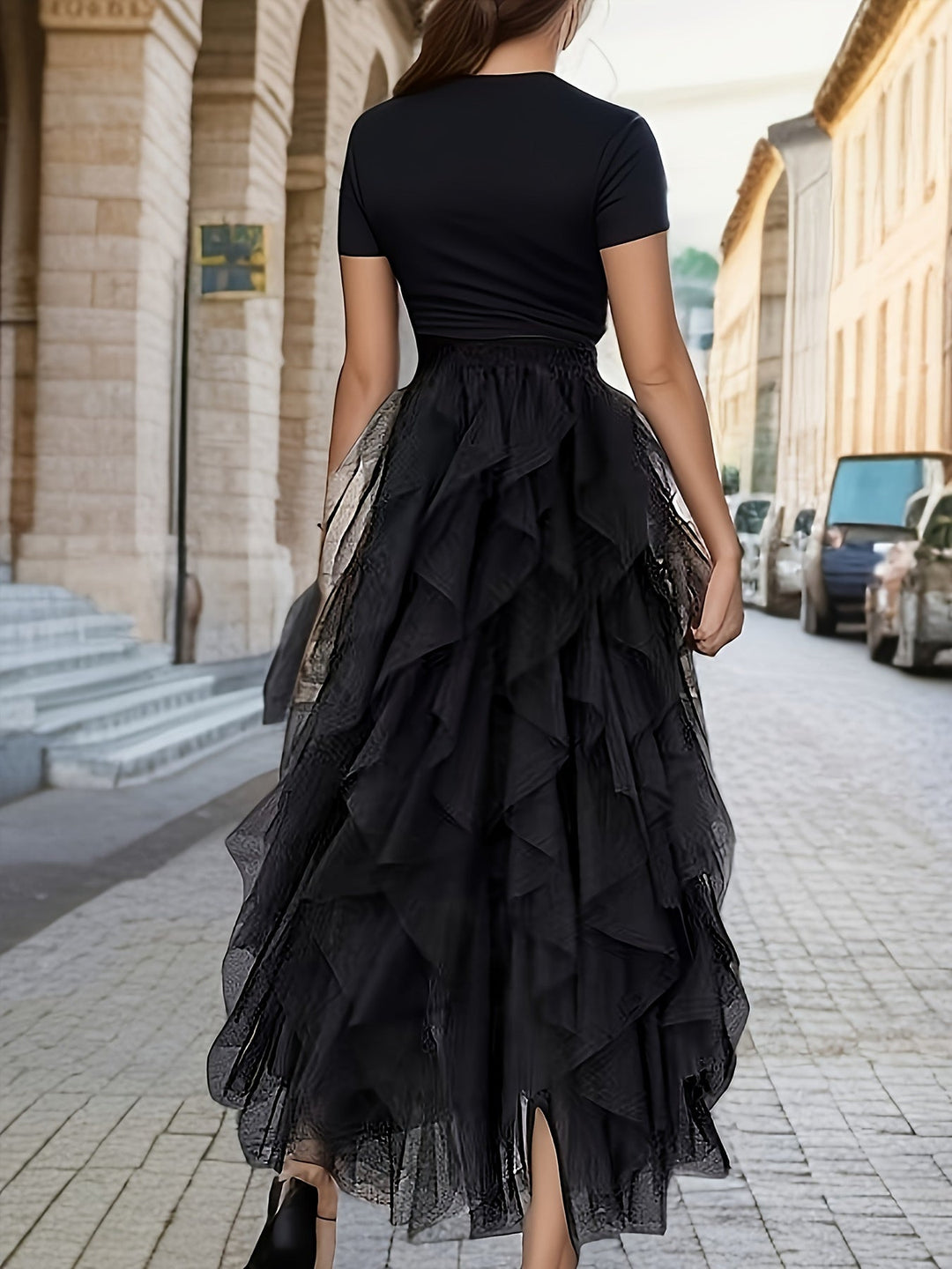 Stijlvolle zwarte maxi rok voor dames, met gelaagde stof en comfortabele elastische taille, ideaal voor casual.