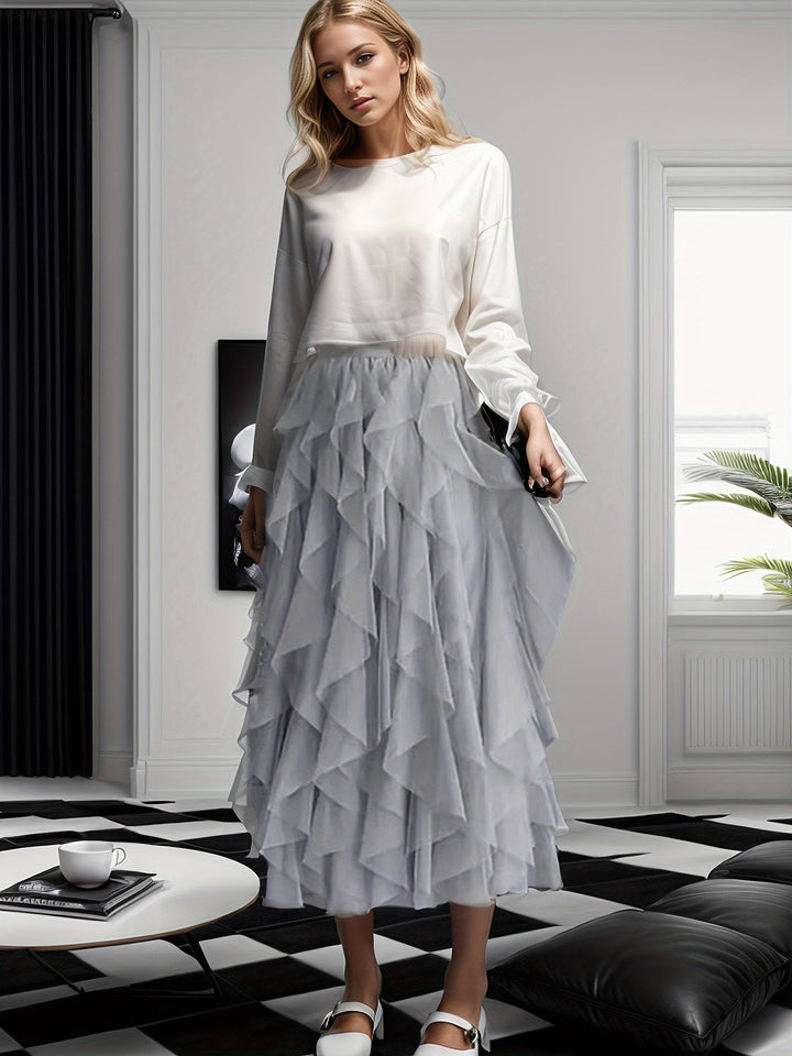 Zwarte gelaagde dames rok, een veelzijdige maxi rok met elastische taille voor zowel casual als chique momenten.
