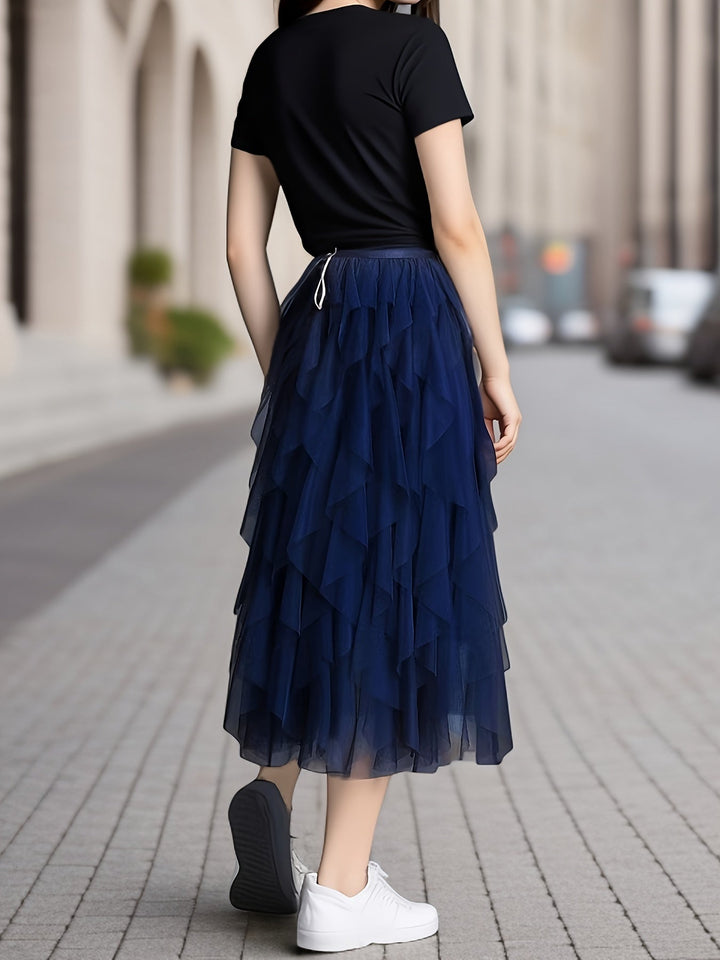 Chique abrikooskleurige gelaagde maxi rok voor dames, comfortabel met elastische taille en perfect voor elke gelegenheid.