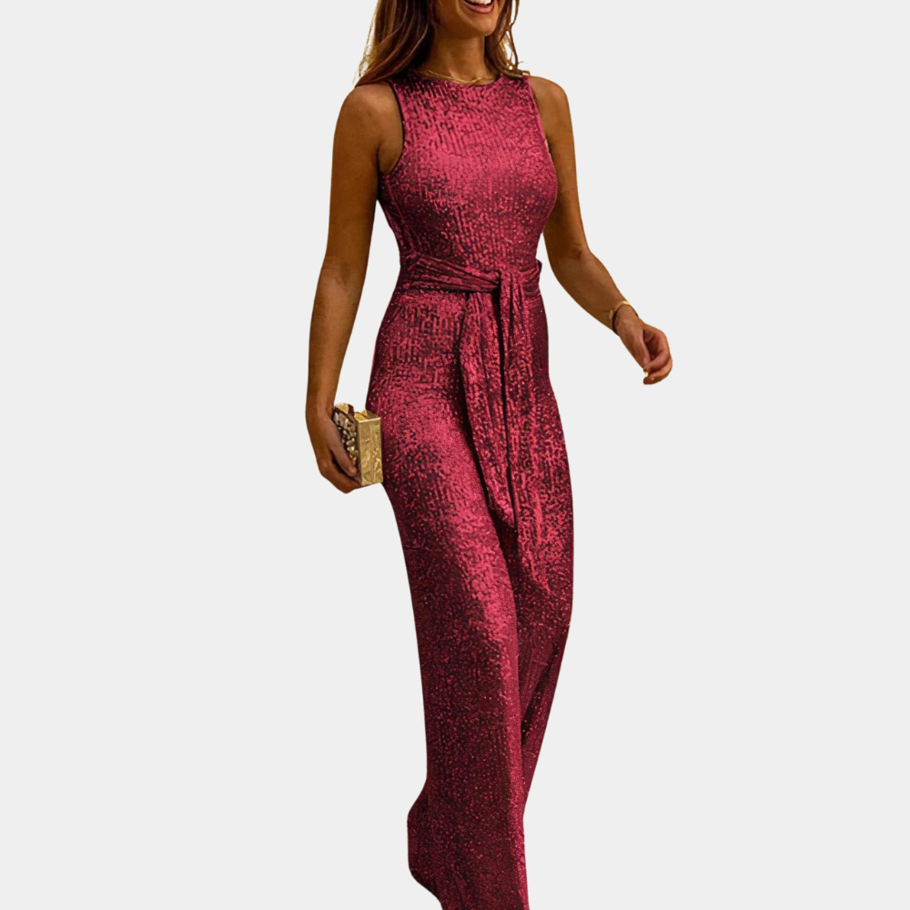 Sprankelende dames jumpsuit met glitter, een elegante keuze voor avondkleding en feestelijke gelegenheden. Chique design.