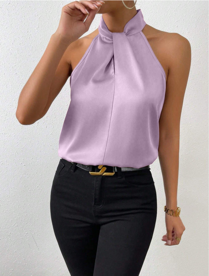 Elegant en veelzijdig: dames haltertop met gedraaide hals, mouwloos en comfortabel voor de zomer.