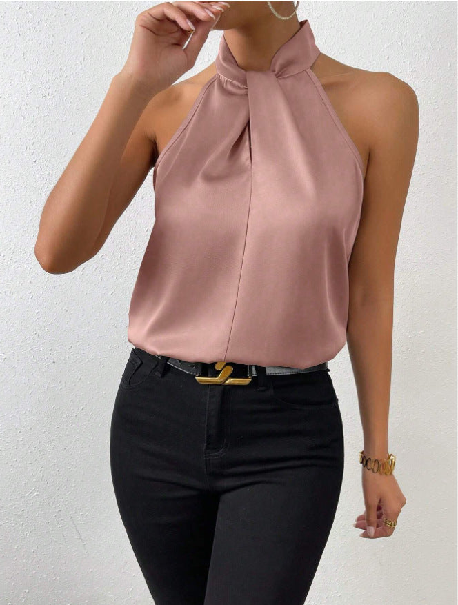 Trendy dames haltertop, mouwloos, met gedraaide hals. Een must-have voor je zomerkleding collectie.