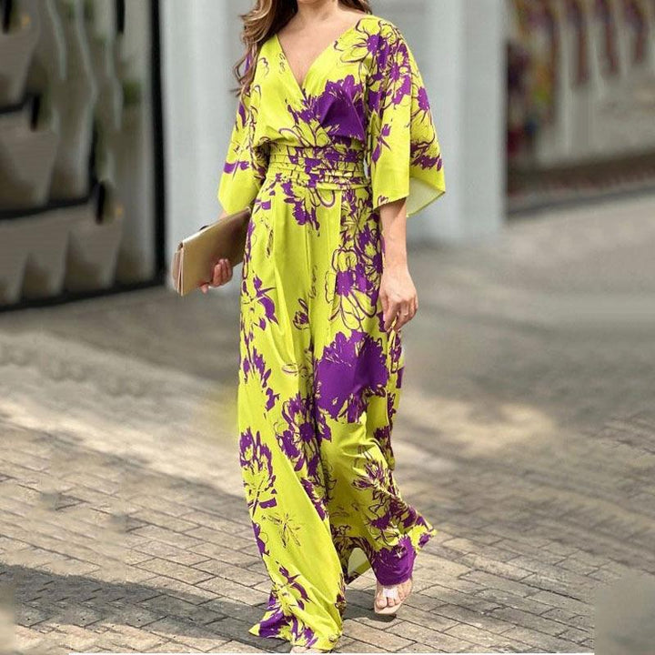 Stijlvolle dames jumpsuit met bloemenprint, wijde pijpen. Ideaal voor een modieuze en comfortabele look.