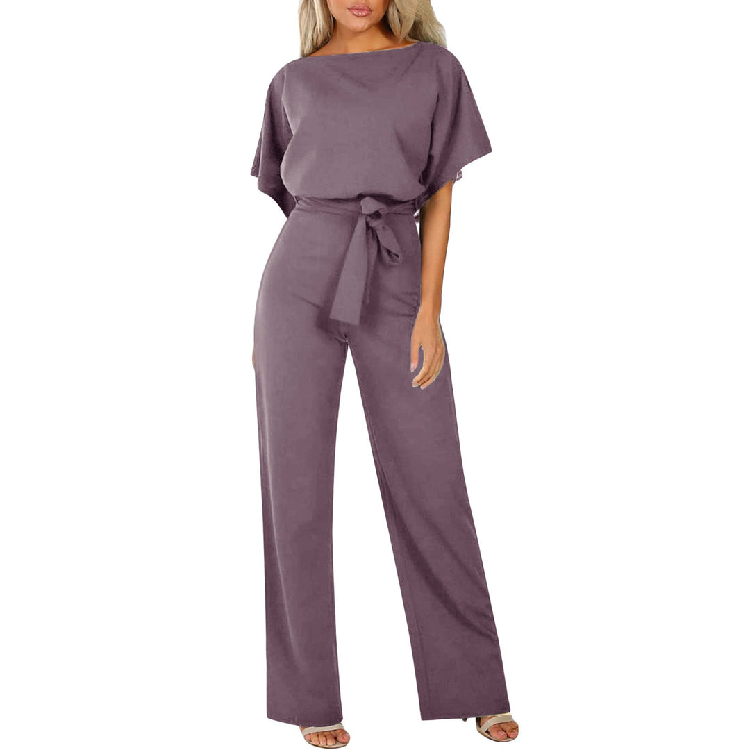 Stijlvolle dames jumpsuit met boothals, flatterende tailleceintuur en wijde pijpen, ideaal voor elke gelegenheid.