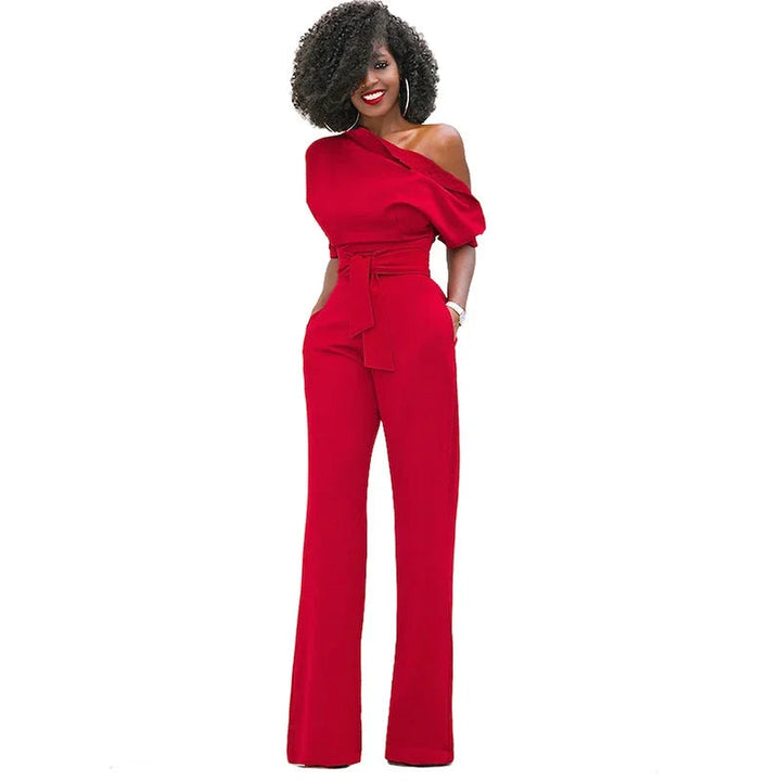 Luxe dames jumpsuit met open schouder, strikband en wijde pijpen voor een stijlvolle, comfortabele statement look.