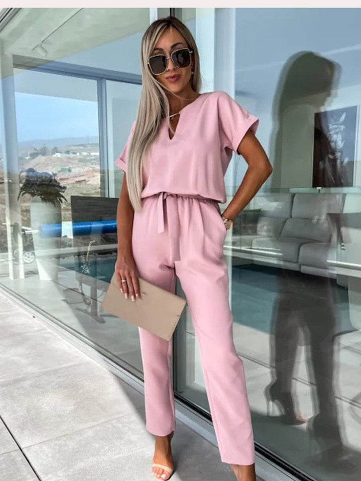 Veelzijdige dames jumpsuit met V-hals, elastische taille; geschikt voor zowel casual als avondgelegenheden.