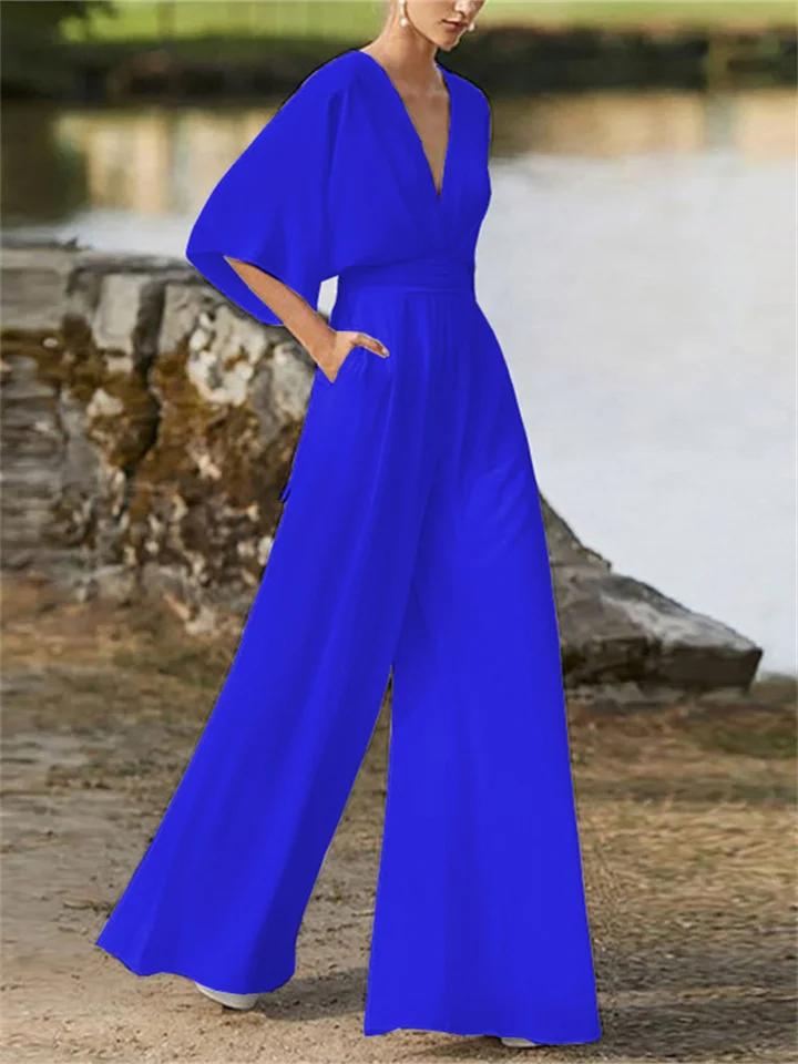 Veelzijdige dames jumpsuit, V-hals, wijde pijpen, vleermuismouwen, geschikt voor zowel casual als feestelijke stijl.