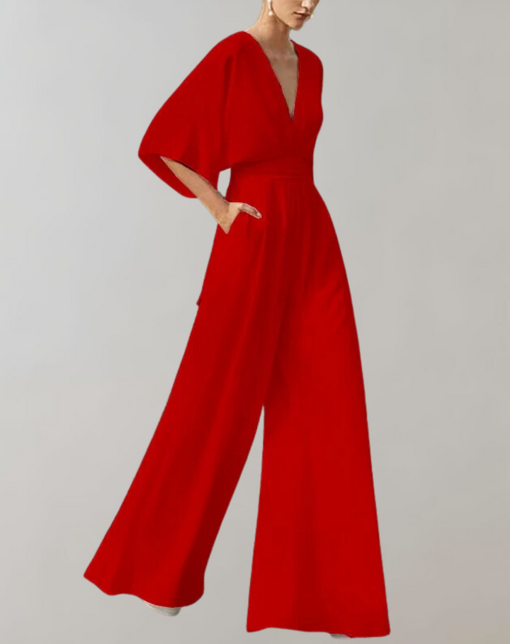 Zomerse dames jumpsuit met flowy wijde pijpen, V-hals voor een luchtige elegante look.