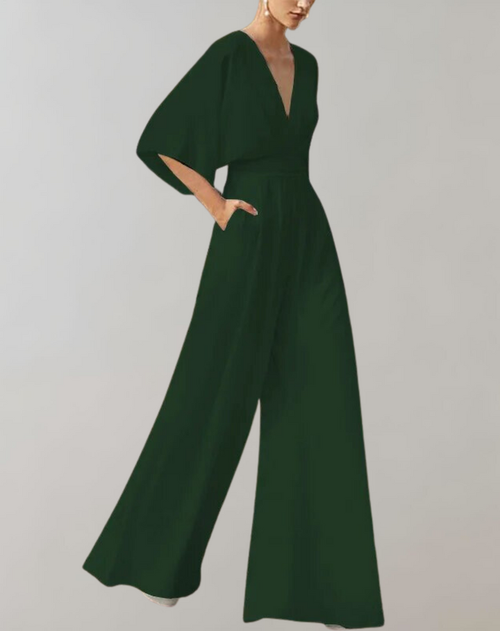 Elegante V-hals jumpsuit voor dames met wijde pijpen, geschikt als feestkleding of chique dagoutfit.