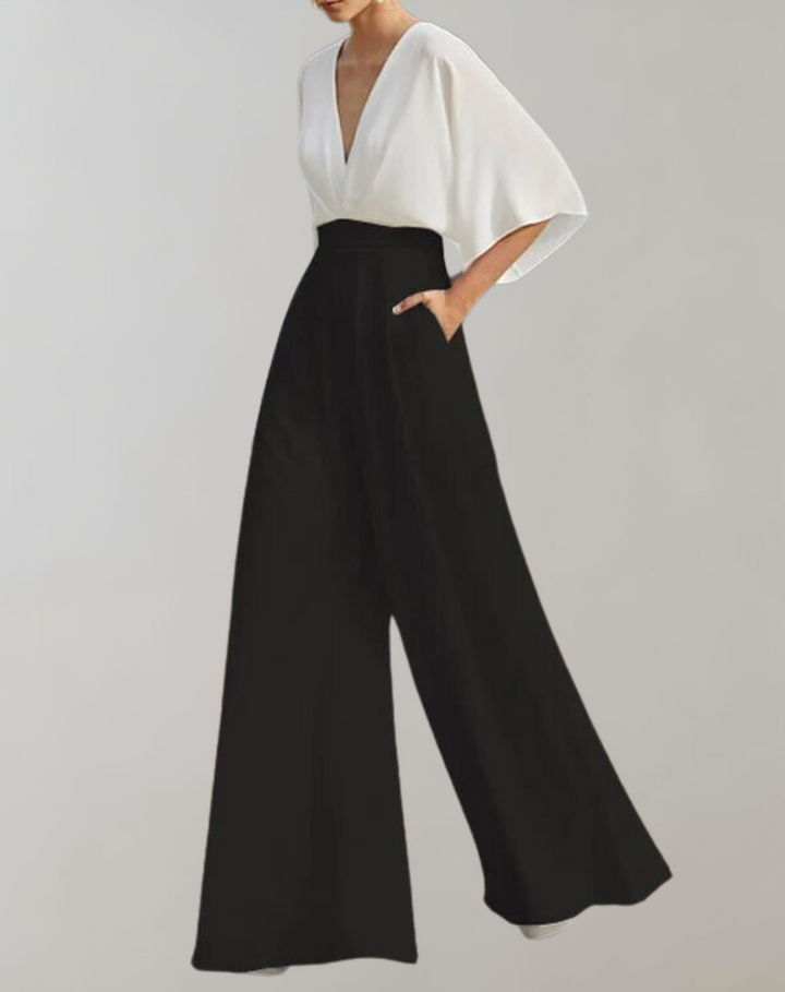 Modieuze jumpsuit dames, comfortabel met wijde pijpen en V-hals, voor een sophisticated look.