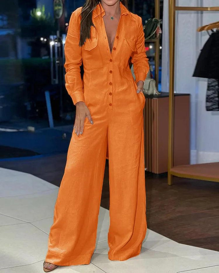 Veelzijdige dames jumpsuit met wijde pijpen en lange mouwen. Tijdloos design voor een elegante en comfortabele look.