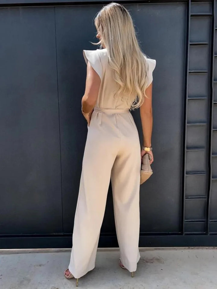 Verfijnde dames jumpsuit met vloeiende wijde pijpen en elegante mouwloze pasvorm, zomermode.