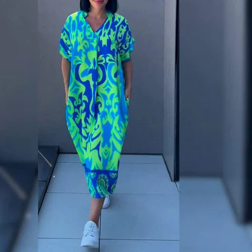 Luchtige midi kaftan zomerjurk voor dames, ideaal voor lentemode en zomerse dagen, met kleurrijk design.