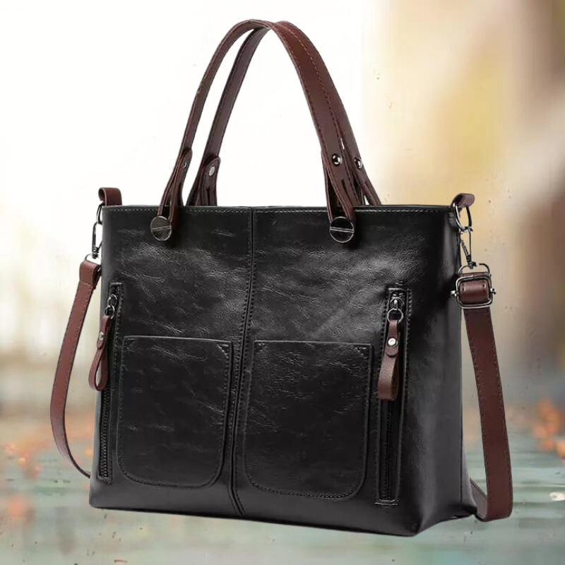 Bruine leren schoudertas voor dames. Luxe, stijlvolle handtas met verstelbare riem, een mode accessoire voor vrouwen.
