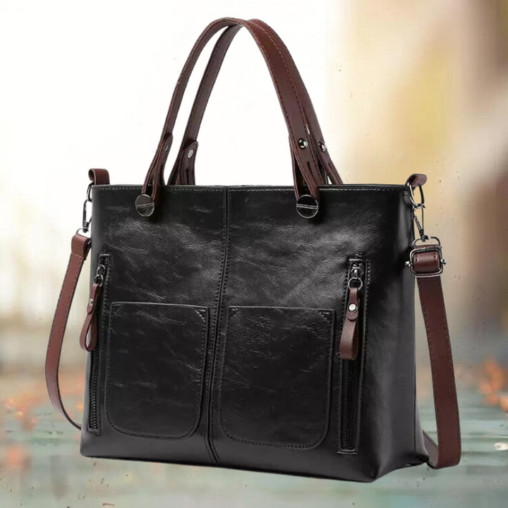 Bruine leren schoudertas voor dames. Luxe, stijlvolle handtas met verstelbare riem, een mode accessoire voor vrouwen.