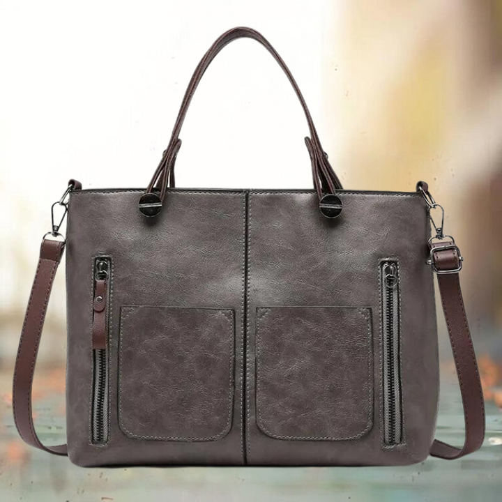 Zwarte leren schoudertas, elegant accessoire voor dames. Stijlvolle handtas, perfect voor dagelijks gebruik of avondje uit.
