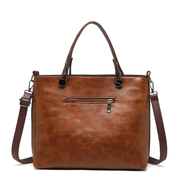 Close-up van de hoogwaardige leren textuur van de dames schoudertas. Een luxe en duurzame mode-accessoire.