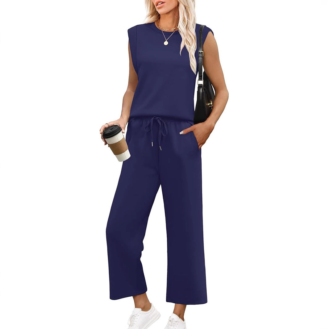 Tweedelige dames loungewear set: comfy top en modieuze wijde broek. Perfecte relaxkleding.