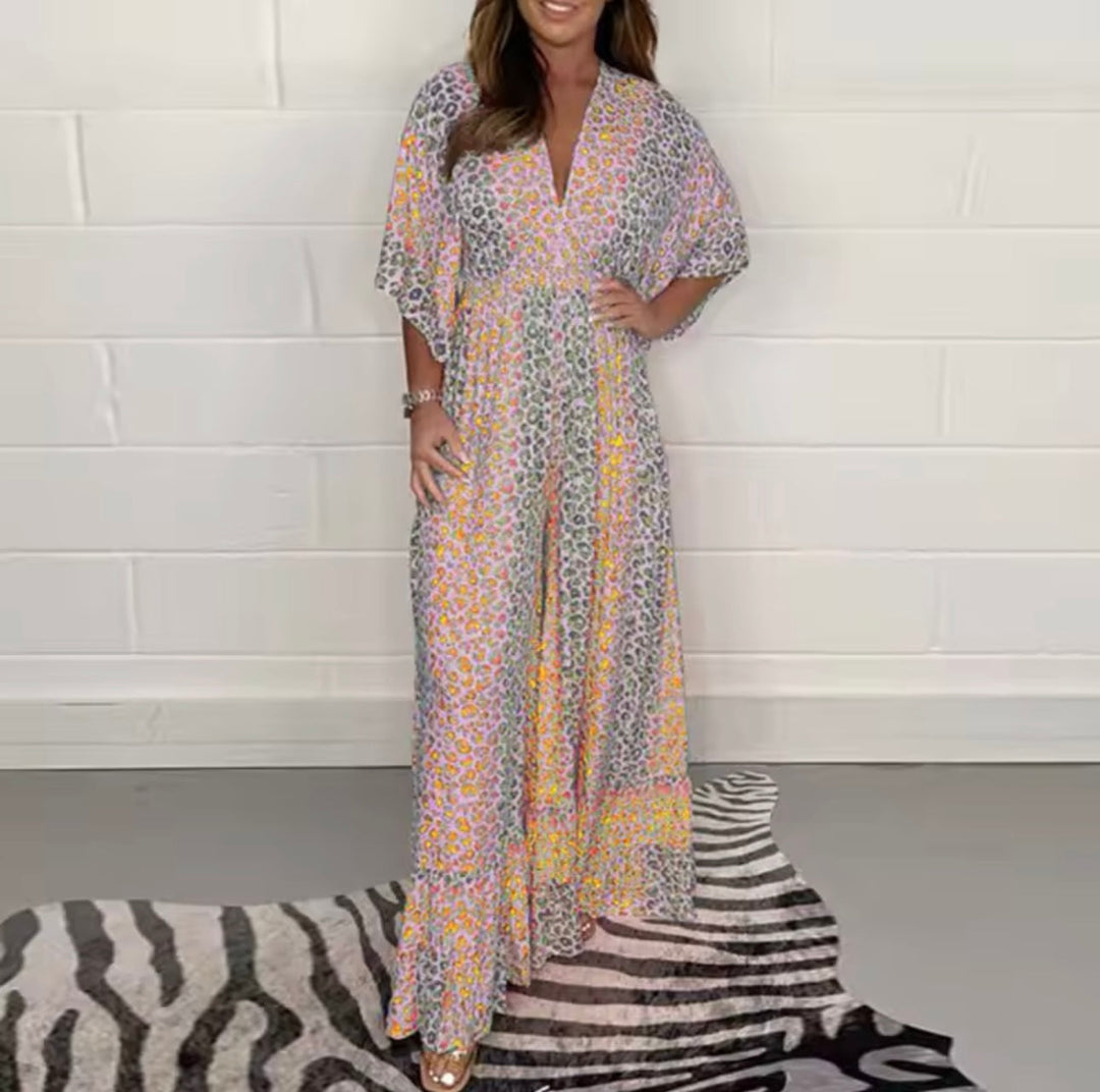 Stijlvolle dames luipaardprint jumpsuit, V-hals, trendy en veelzijdig voor elke gelegenheid.