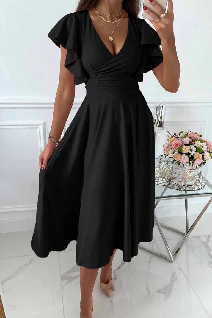 Verfijnde dames midijurk met vlindermouwen, een elegante gala jurk voor een chique uitstraling.