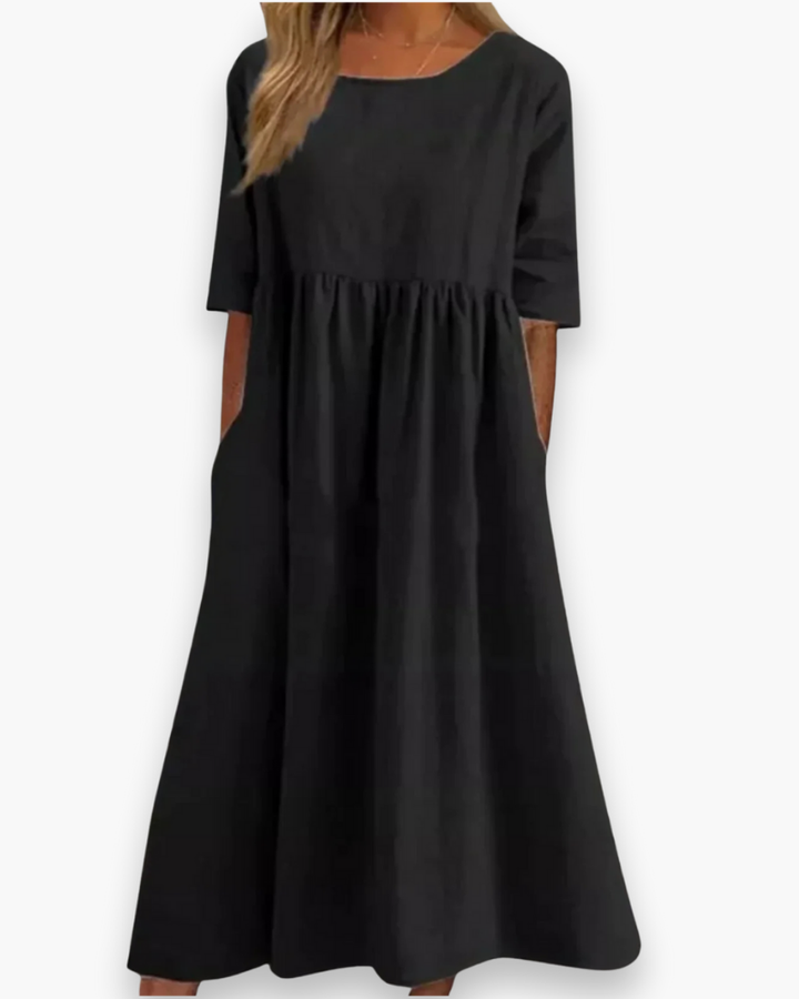 Comfortabele damesjurk: een tijdloze midi-jurk met halve mouwen en ronde hals voor elke vrouw.