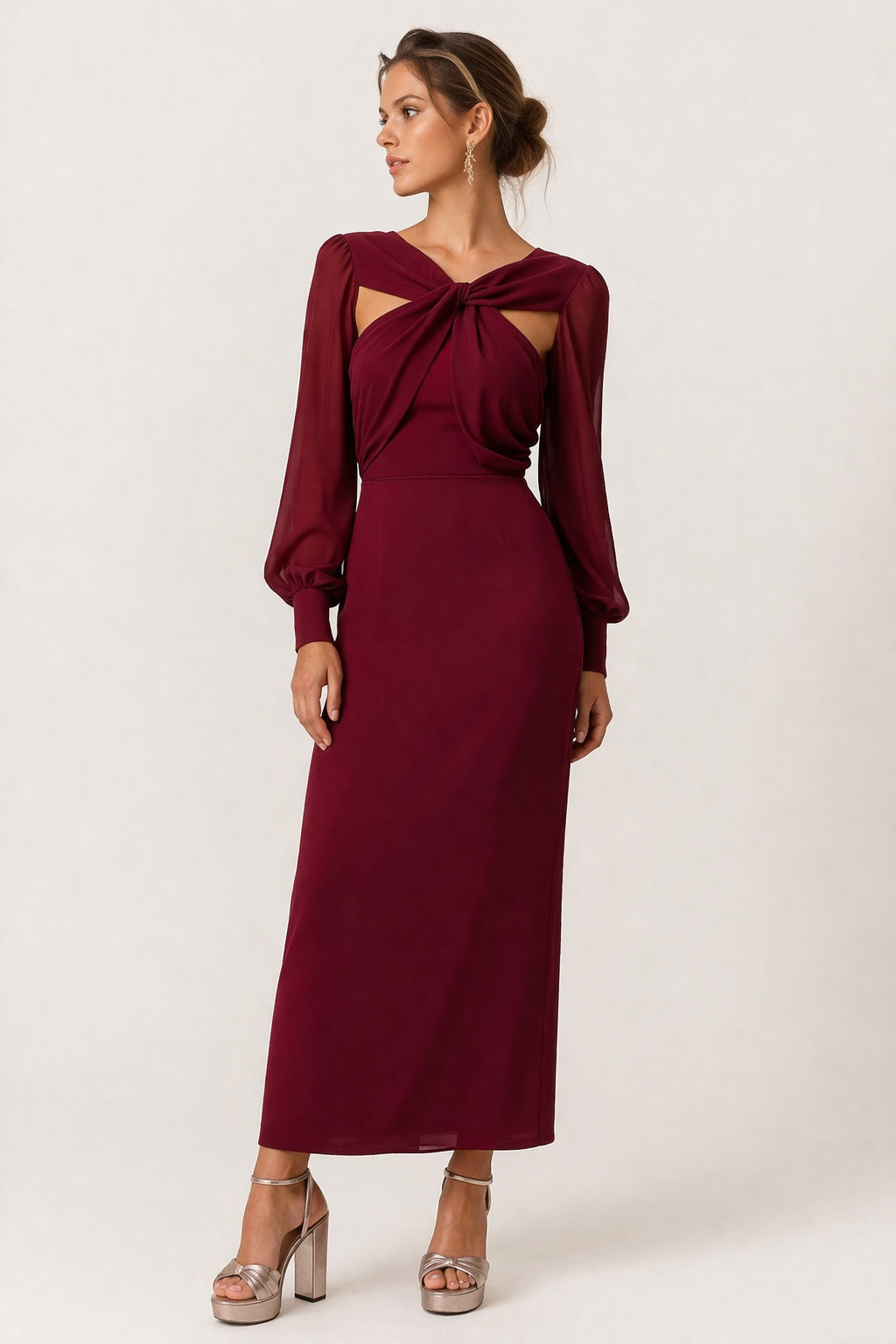 Elegante dames midi-jurk met lange mouwen en knoopdetail. Perfect voor casual of feestelijke gelegenheden.