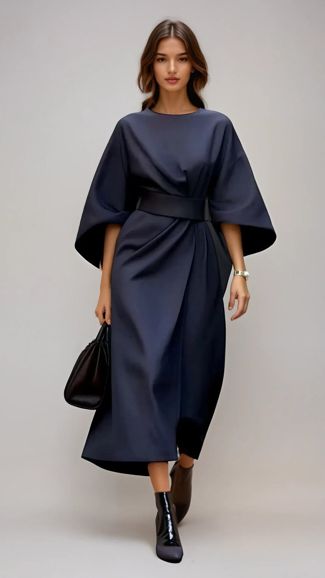 Comfortabele en elegante dames jurk met tijdloze pasvorm en charmante lantaarnmouwen. Stijlvolle casual chic kleding.