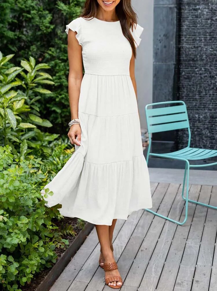 Elegante dames midi zomerjurk met flatterende vlindermouwen, ideaal voor casual of feestelijke gelegenheden.