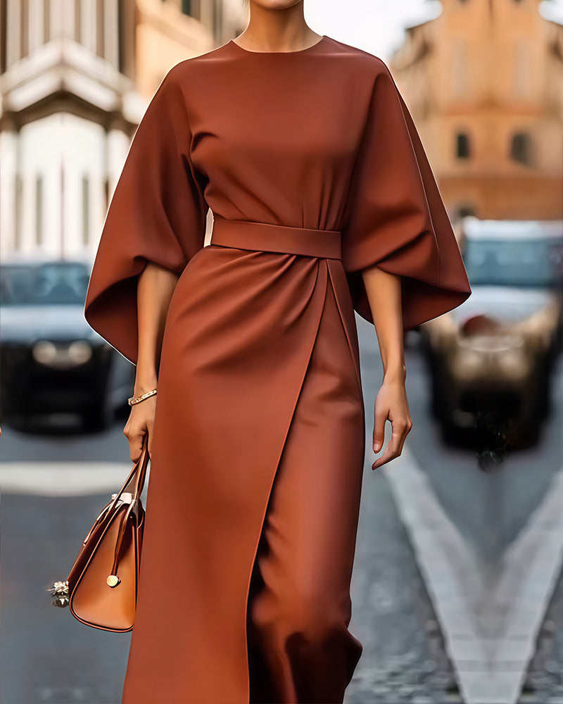 Elegante dames midi zomerjurk met strikceintuur, perfect voor feestjes of een stijlvolle casual look.
