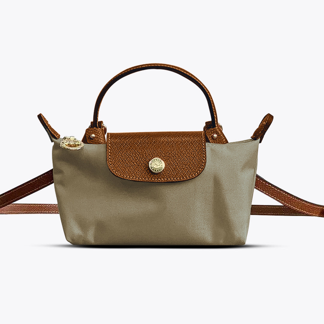 Moderne dames mini handtas, ook als kruistas te dragen, met genoeg ruimte voor essentials en verstelbare riem.