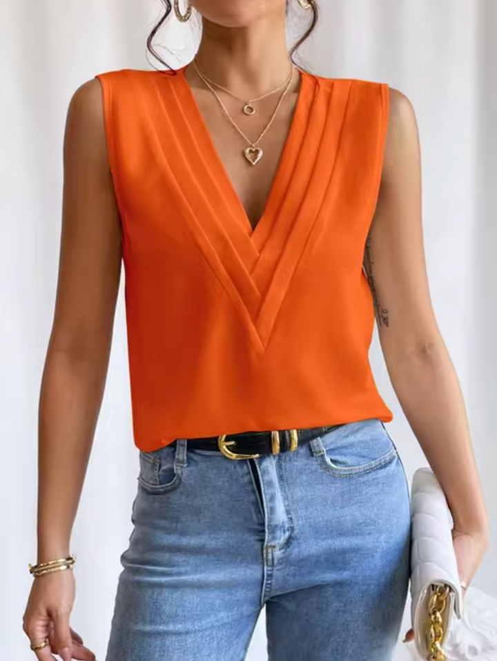 Chic en comfortabel: deze mouwloze V-hals dames top is een stijlvolle toevoeging aan elke zomergarderobe.
