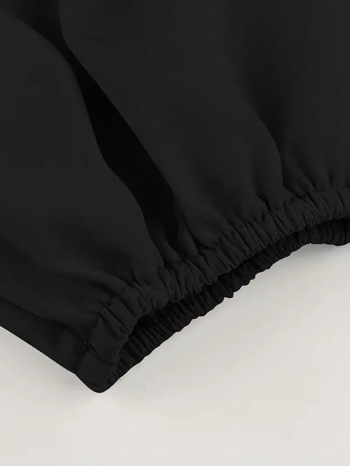 Dames off-shoulder blouse in lichtblauw met lange mouwen, elegante strikjes en een modieuze pasvorm.